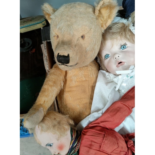 107 - A selection of vintage teddy bears and dolls