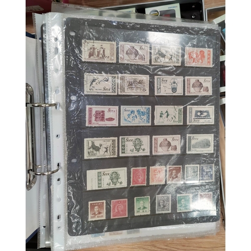 137C - A selection of Chinese stamps including Chairman Mao stamps