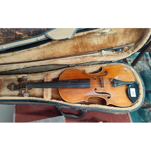 172 - A late 19th/early 20th century two piece birch back violin, marked HOPF with bow and hard case (spli... 