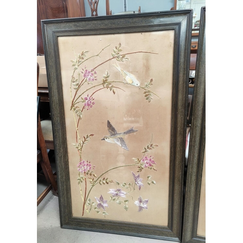 94 - Three early 20th Chinese large embroidered silk pictures, birds in trees, framed and glazed