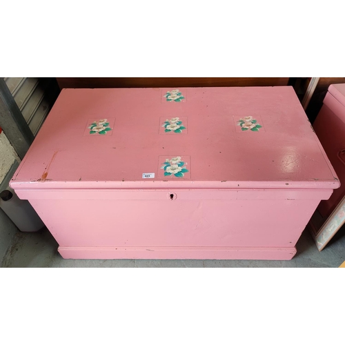 665 - A 19th century pink painted pine bedding box and a leather suitcase