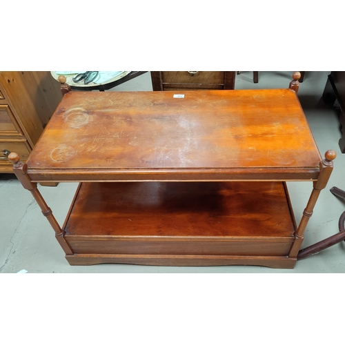 712 - A reproduction yew wood 2 tier coffee table