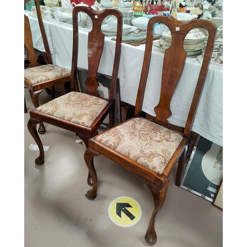 770A - A set of 4 1930's stained walnut dining chairs with floral seats