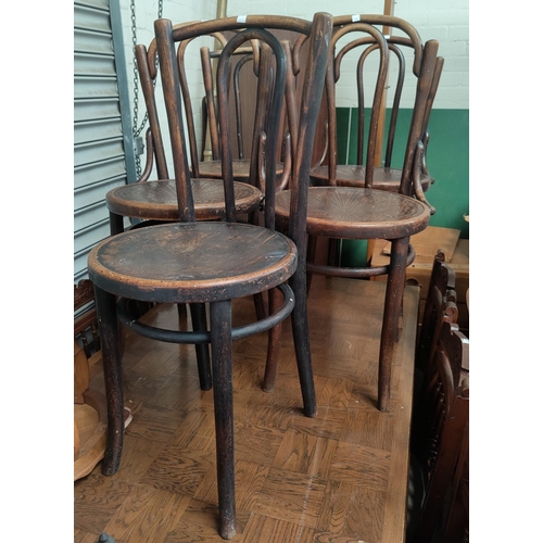 690 - A 1930's set of 5 bentwood dining chairs (some top rails split)