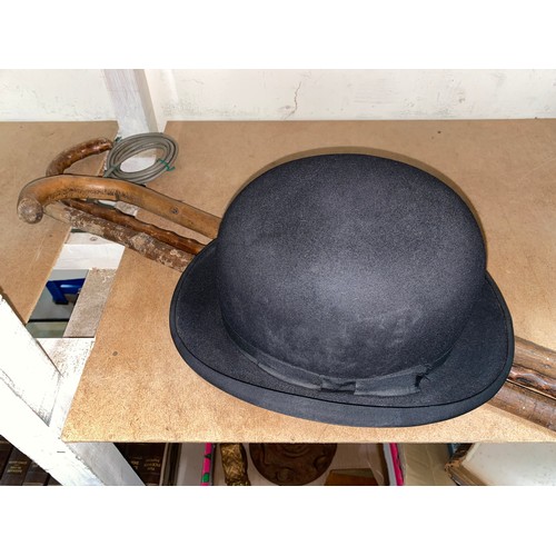 101 - A 1930's aneroid barometer, 2 walking sticks and a bowler hat