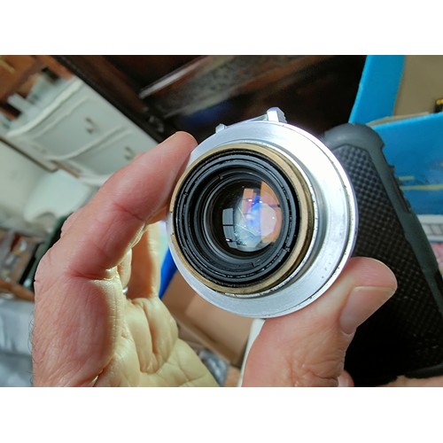 117 - A LEICA M2 chrome 35mm camera c.1960, serial no 966842, with 35mm f2 Summicron lens, leather E.R. ca... 