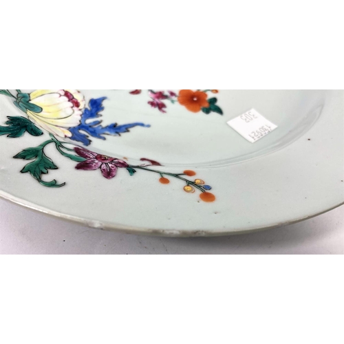 303 - A pair of 18th century Chinese plates with polychrome decoration of flowers, diameter 23cm (minor fr... 