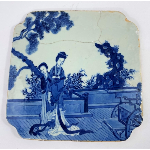 304 - A 19th century Chinese blue and white tile decorated with traditionally dressed female figures, of s... 