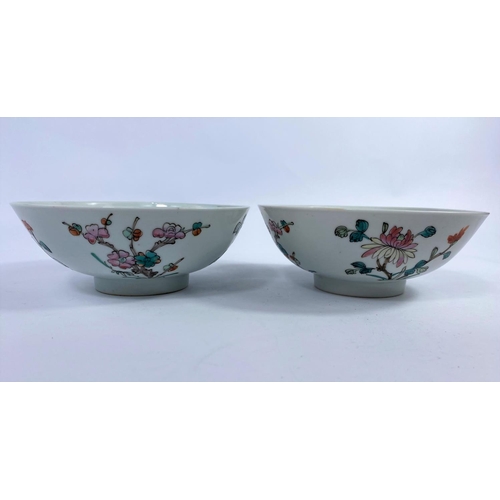 306 - Two 19th century Chinese bowls with floral decoration to exteriors and marks to base, d. 16cm