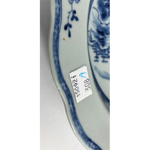 308A - A pair of 18th century Chinese blue and white shallow dishes with traditional mountain scenes, scall... 