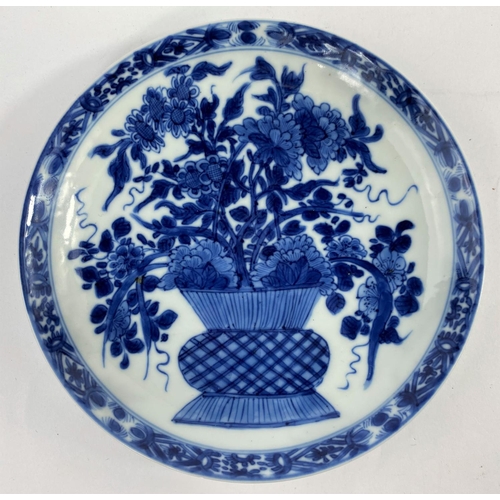 310A - A fine 18th century Chinese porcelain dish with central decoration of vase with flower arrangement, ... 