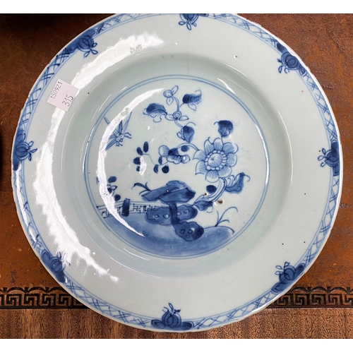 315 - A Chinese famille rose bowl, d. 29cm (restored) and 2 Chinese blue and white plates (Long hairline c... 