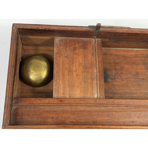 332 - A 19th century Chinese hardwood smoker's box/tray with partly fitted interior and pipe, 25 x 28 cm