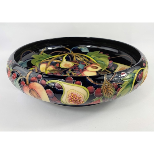 401D - A large and impressive MOORCROFT bowl decorated in the Queen's Choice pattern by Emma Bosson, whose ... 