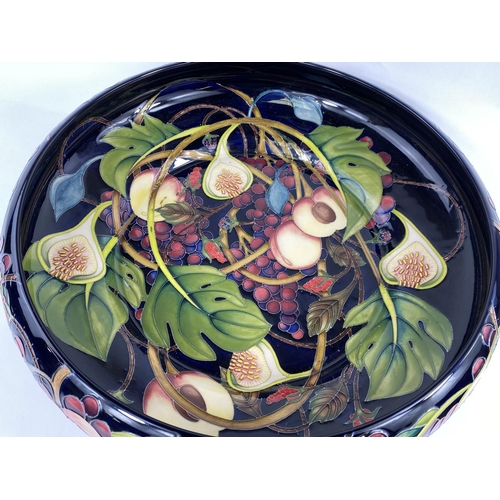 401D - A large and impressive MOORCROFT bowl decorated in the Queen's Choice pattern by Emma Bosson, whose ... 