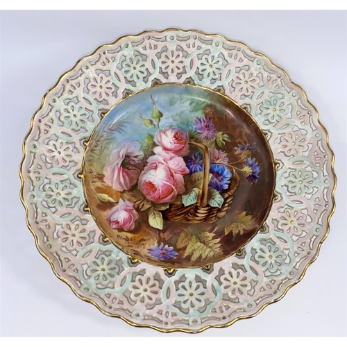 421 - A 19th century Irish porcelain shallow dish with pierced border and central hand painted floral pane... 