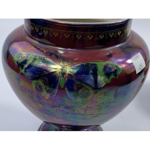 425 - A 1930's Shelley lustre dripware vase decorated with butterflies, signed Walter Slater, height 19.5 ... 