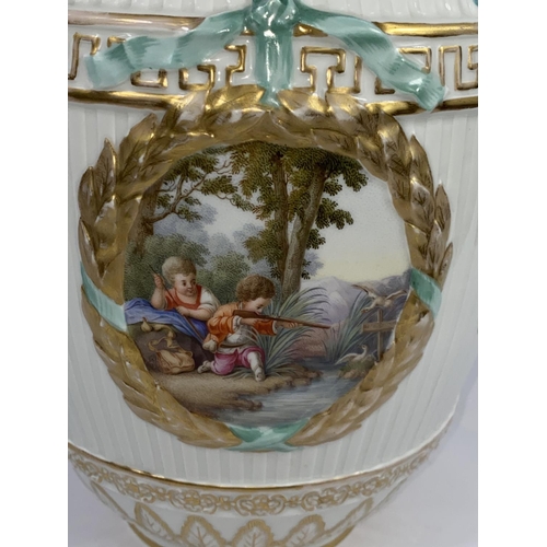 436 - A 19th century KPM Berlin covered porcelain vase with ribbed body, decorated with 2 wreathed panels ... 