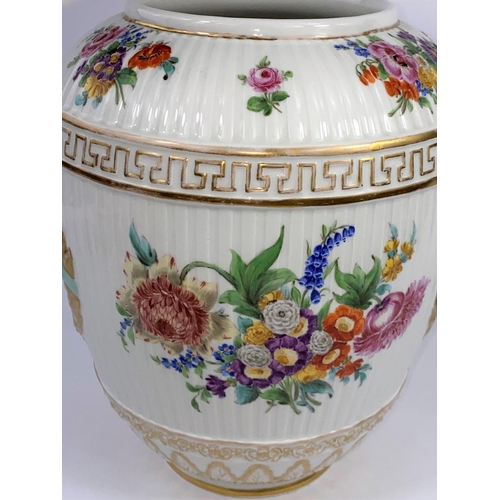 436 - A 19th century KPM Berlin covered porcelain vase with ribbed body, decorated with 2 wreathed panels ... 