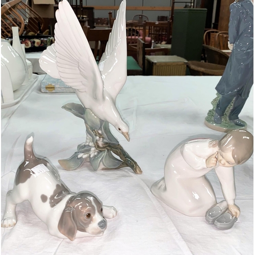 441 - Three Lladro figures:  dove; puppy & girl with slippers