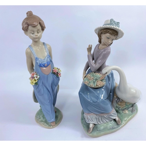 442 - A Lladro collectors figure:  flower girl in dungarees, height 24 cm; a group:  girl with grapes and ... 