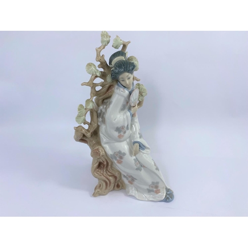 452 - A Lladro group:  Japanese lady by a tree, height 32 cm