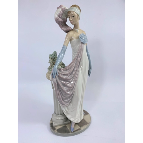 455 - A Lladro figure in 1920's dress, height 35 cm