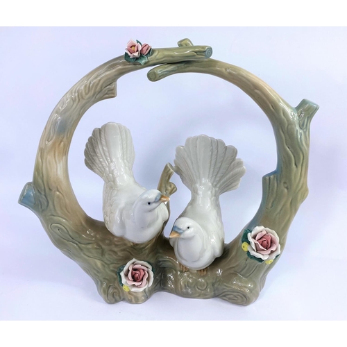 458 - A Lladro style group:  2 doves in a bower, height 33 cm; a 1930's 'Sylvan' lustre jug; a Capodimonte... 