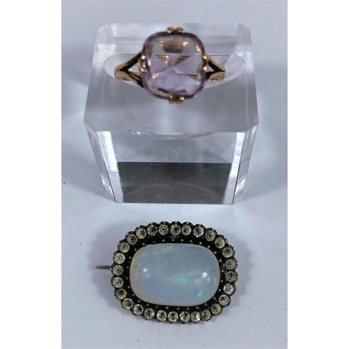 478 - A 19th century opal brooch in paste setting, opal 18 x 12 mm; a 9 carat gold ring
