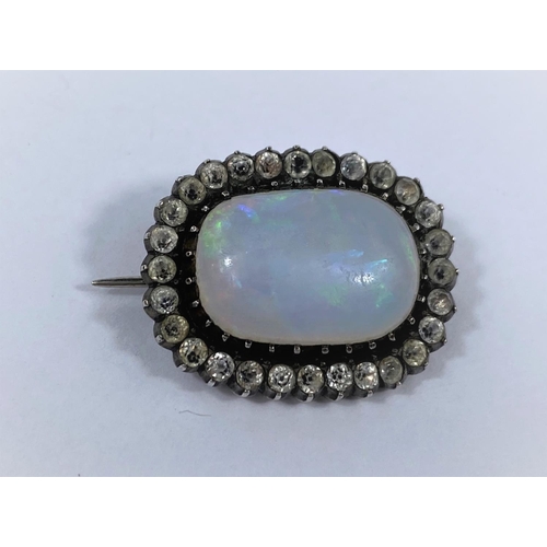 478 - A 19th century opal brooch in paste setting, opal 18 x 12 mm; a 9 carat gold ring