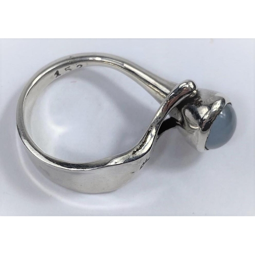 496 - A George Jensen silver ring designed by V Torun  Bülow-Hübe, with oval moonstone in raised 'Y' setti... 