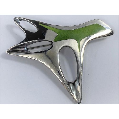 497 - A George Jensen silver abstract brooch designed by Henning Koppel, pierced and with green enamel dec... 