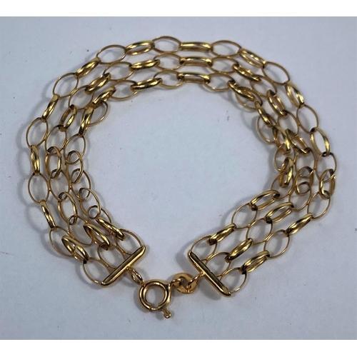 501 - A modern yellow metal gate bracelet, stamped '375', 4.8 gm