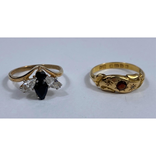 516 - An 18 carat hallmarked gold Victorian style dress ring set garnet, 2 gm;  a 9 carat hallmarked gold ... 