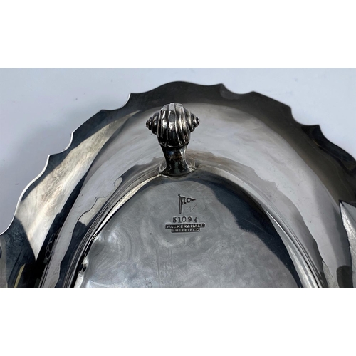 540 - A hallmarked silver oval dish with swing handle and wavy border, Sheffield 1927, length 31 cm, 21 oz