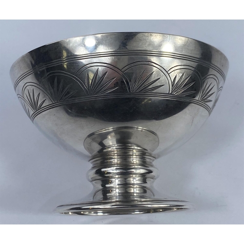 544 - A circular pedestal bowl with chased and engraved band, Sheffield 1930, diameter 12 cm, 8oz