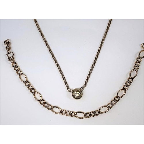 574 - A circular crystal pendant on fine chain, stamped '375', 5.8 gm chain only; a yellow metal chain for... 