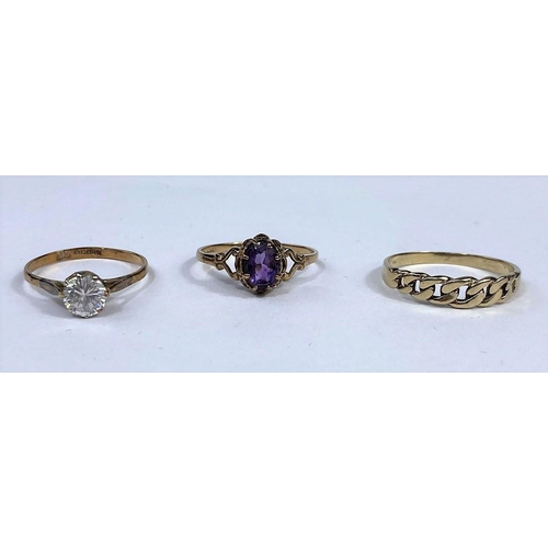 581 - A 9 carat hallmarked gold ring in the Victorian style, set amethyst; a yellow metal ring with curb l... 