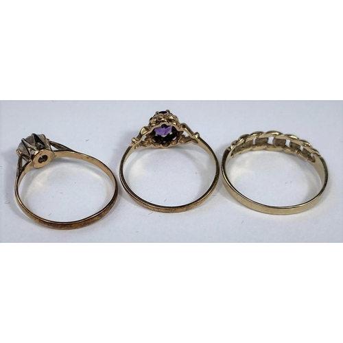 581 - A 9 carat hallmarked gold ring in the Victorian style, set amethyst; a yellow metal ring with curb l... 