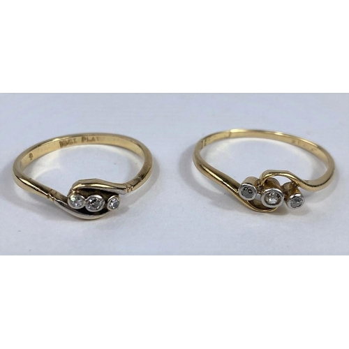 582 - Two yellow metal crossover rings, each set 3 diamonds, stamped '18ct', 3.9 gm