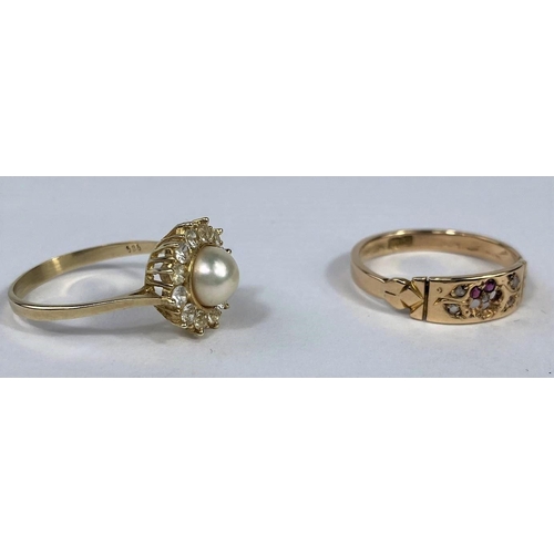 584 - A yellow metal dress ring set central pearl surrounded by clear stones, stamped '585'; a Victorian s... 