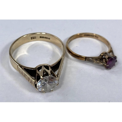 585 - A modern 9 carat hallmarked gold dress ring set with a large clear stone, 4.1 gm; a 9 carat hallmark... 