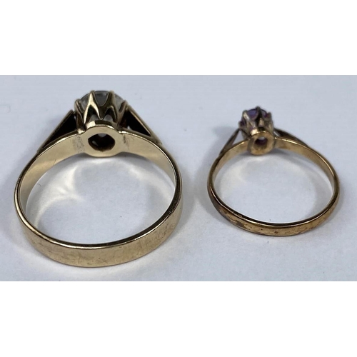 585 - A modern 9 carat hallmarked gold dress ring set with a large clear stone, 4.1 gm; a 9 carat hallmark... 