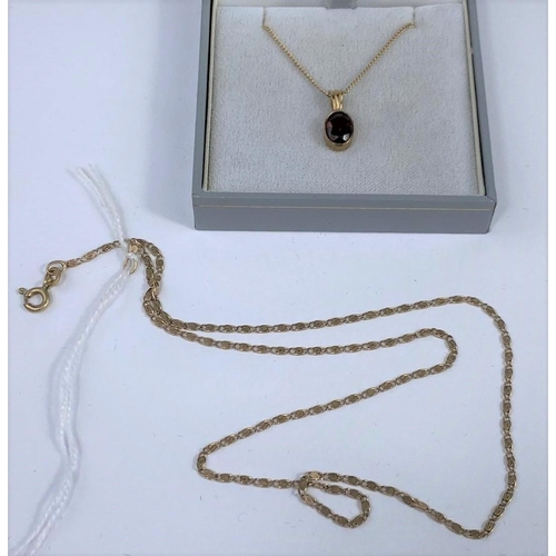 590 - A 9 carat hallmarked gold garnet set pendant, boxed; a 9 carat hallmarked gold chain, 5.1 gm gross