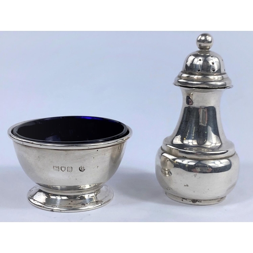 605 - A hallmarked silver salt and pepper pot, London 1912