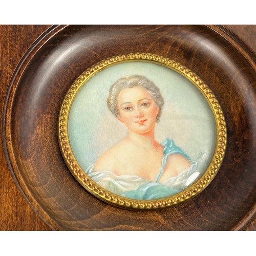 647 - Two hand painted portrait miniatures:  Mdme de Pompadour and Madame Adelaide, signed, diameter 55 mm... 