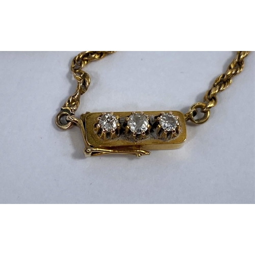 623 - A yellow metal rope twist chain, the box clasp set 3 old cut diamonds, gross weight 7.2 gm, unmarked... 