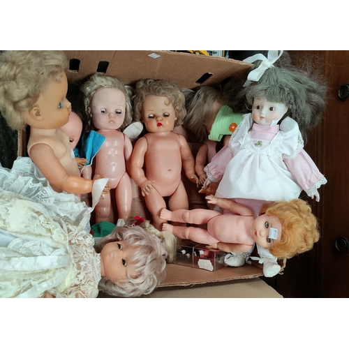 77 - 9 various mid 20th century plastic and composition dolls, a mid 20th century plastic doll, sleeping ... 