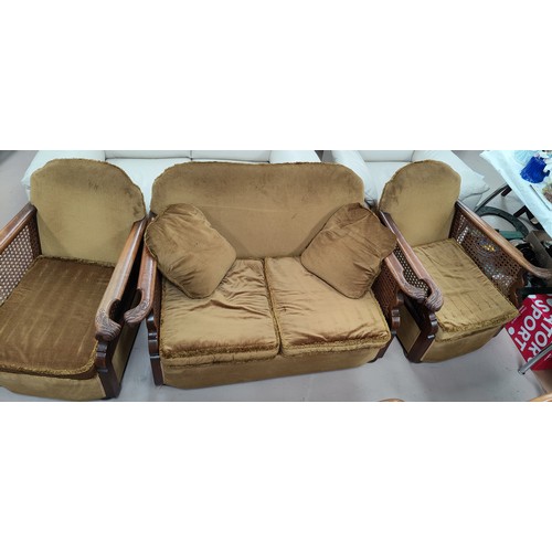 771 - A 1920's/30's 3 piece Bergere suite with golden upholstery, carved and knurled arm rests comprising ... 
