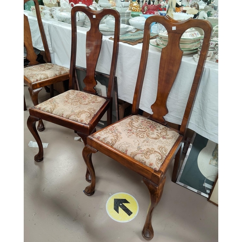 741 - A set of 4 1930's stained walnut dining chairs with floral seats